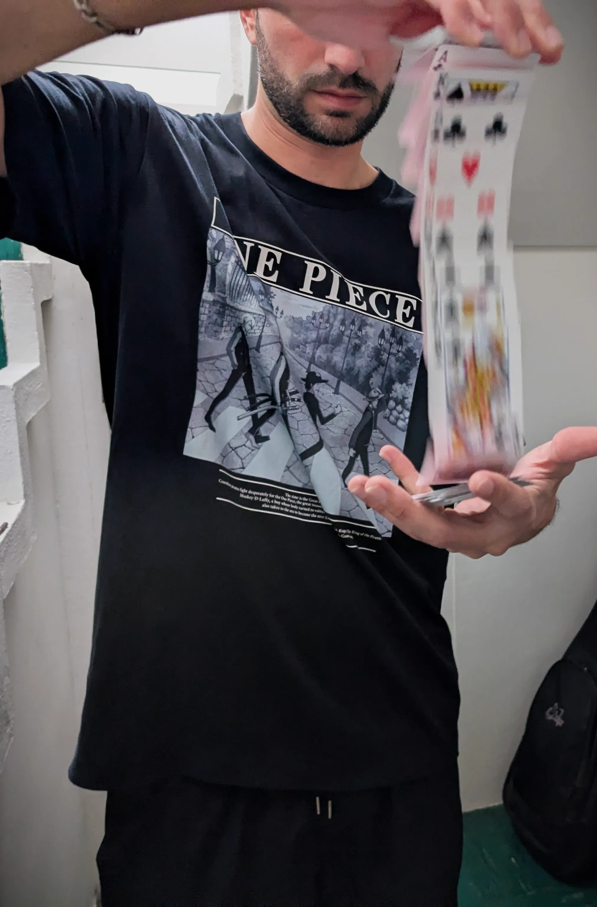 Thibaut performing a card waterfall